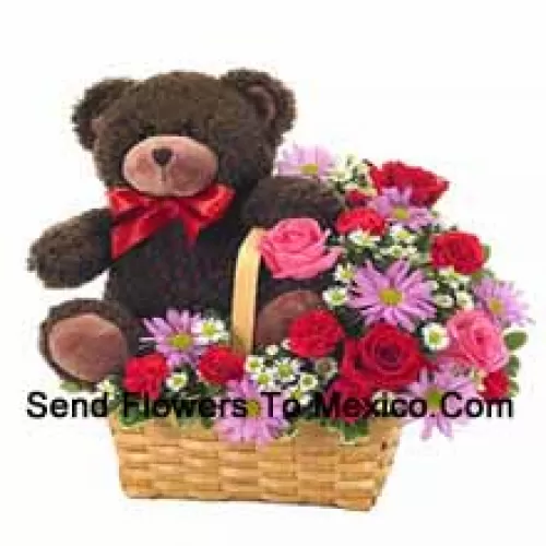 A Beautiful Basket Made Up Of Red And Pink Roses, Red Carnations And Other Assorted Purple Flowers Along With A Cute 14 Inches Tall Teddy Bear