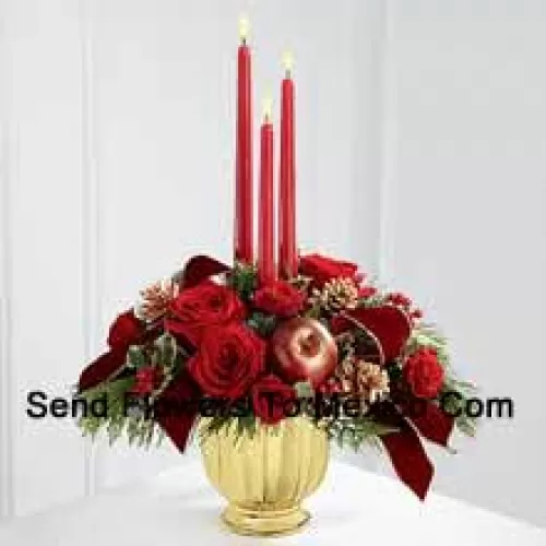 The grandeur and rich beauty of the Christmas season are highlighted with each crimson bloom. Bright red roses and spray roses are arranged in a designer gold container amongst variegated holly and assorted holiday greens. Accented with artificial apples, gold pinecones and gold-edged burgundy ribbon, this gorgeous centerpiece displays three red taper candles to create the perfect atmosphere for their holiday celebration.  (Please Note That We Reserve The Right To Substitute Any Product With A Suitable Product Of Equal Value In Case Of Non-Availability Of A Certain Product)
